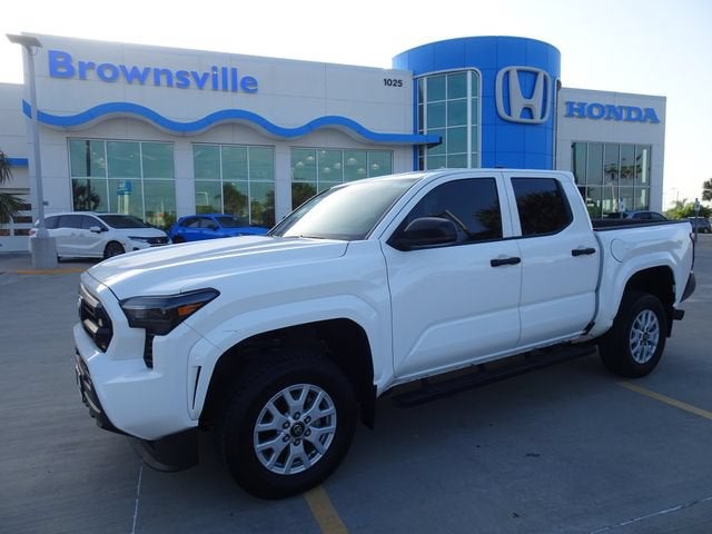 2024 Toyota Tacoma 2WD SR in Ice — front three-quarter view