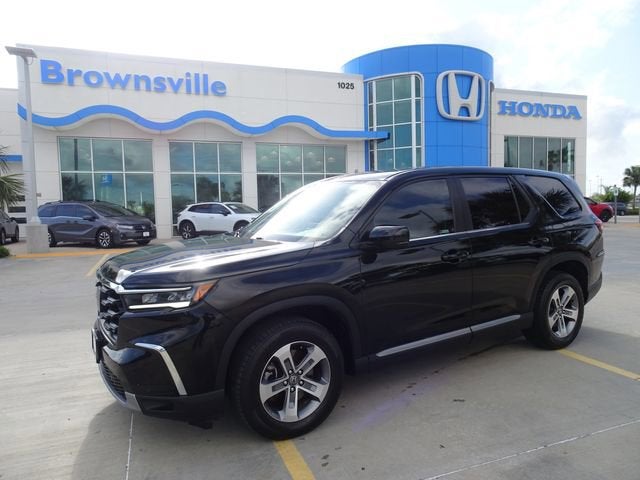 2024 Honda Pilot EX-L 8 Passenger in Crystal Black Pearl — front three-quarter view