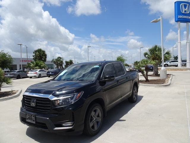 2023 Honda Ridgeline RTL in Crystal Black Pearl — front three-quarter view