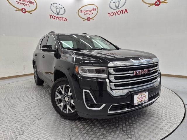 2023 GMC Acadia SLT in Ebony Twilight Metallic — front three-quarter view