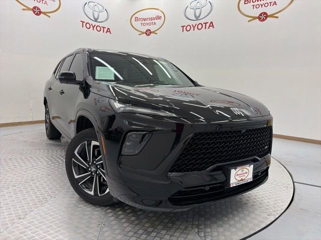 2026 Buick Enclave Sport Touring in Ebony Twilight Metallic — front three-quarter view
