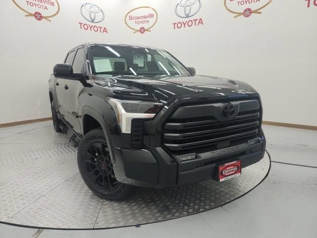 2025 Toyota Tundra 4WD SR5 in Midnight Black Metallic — front three-quarter view