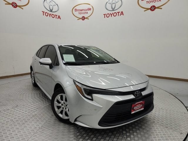 2026 Toyota Corolla Hybrid LE in Classic Silver Metallic — front three-quarter view