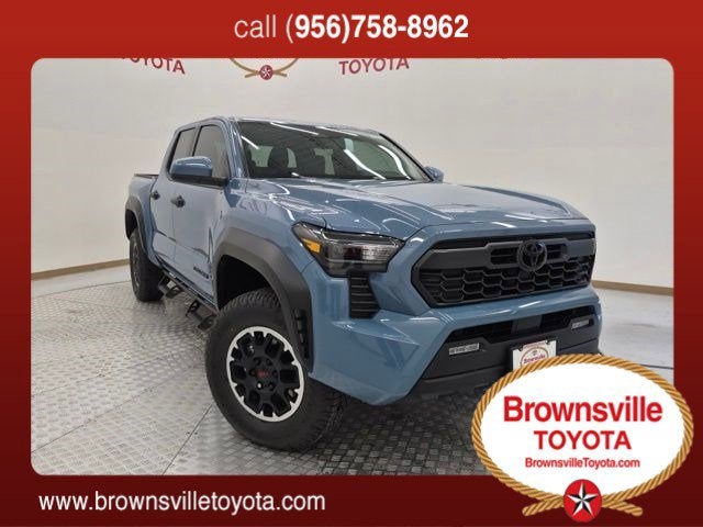 2026 Toyota Tacoma TRD Off-Road in Heritage Blue — front three-quarter view